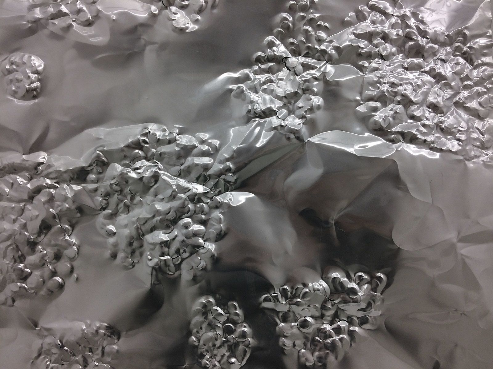 Grey textured artistic depiction of turbulence