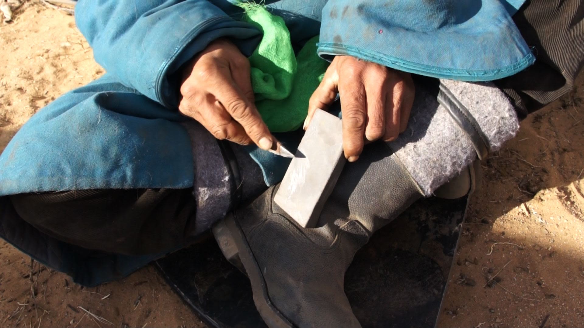 Man sharpening blade