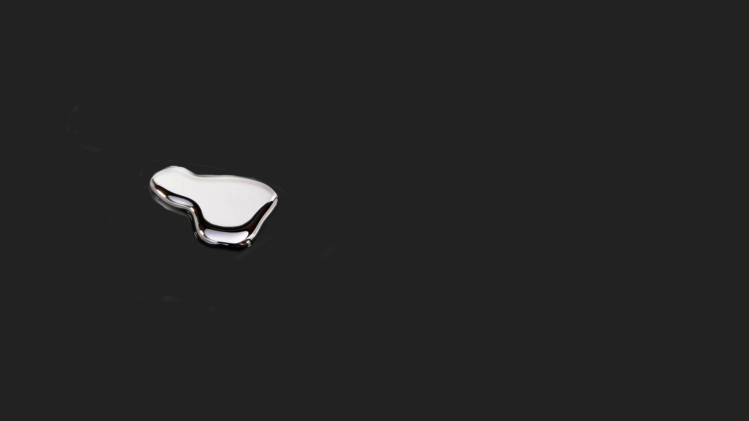 Drop of silvery mercury
