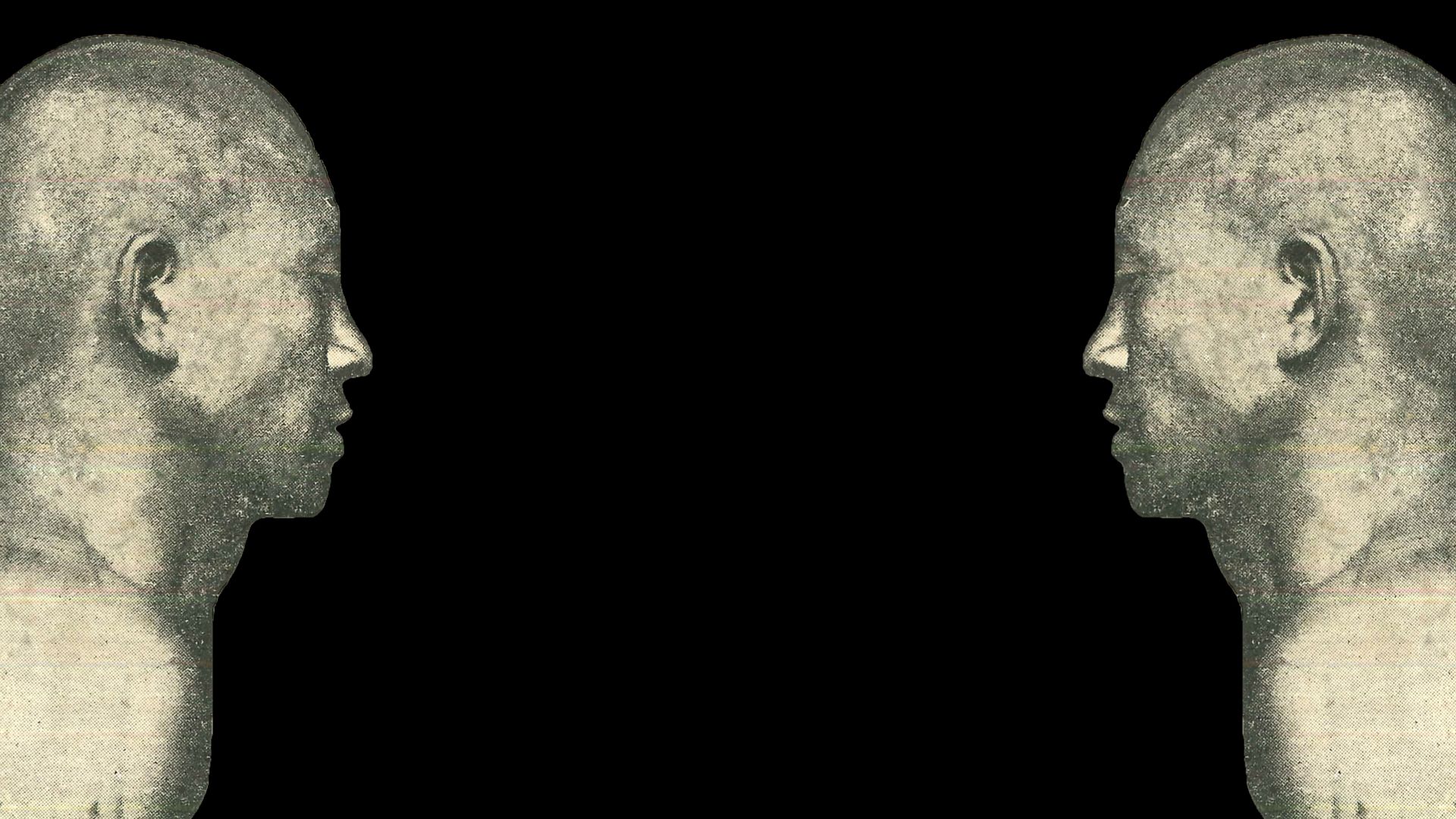 Two bald Chinese men facing each other, upper torseos onlye